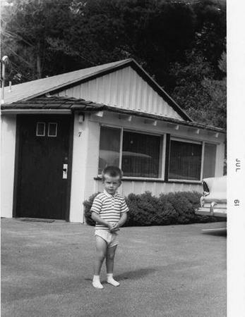 Photo: Kevin as a toddler in front of cottage #7 (current day #17)